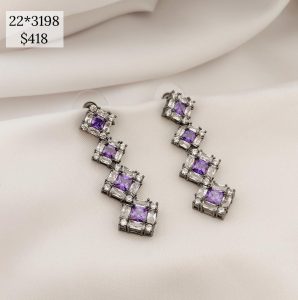 ARETE FIESTERO ZIRCONIAS OVALADAS MORADO