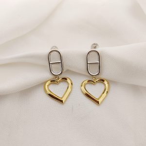 ARETE BICOLOR CON CORAZON COLGANDO