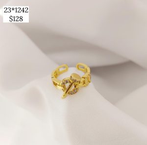 ANILLO CIRCULO Y CLAVO CON ZIRCONIAS