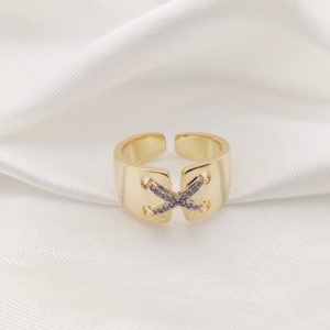 ANILLO BANDA ANCHA ABIERTA CON EQUIS CIRCONIAS