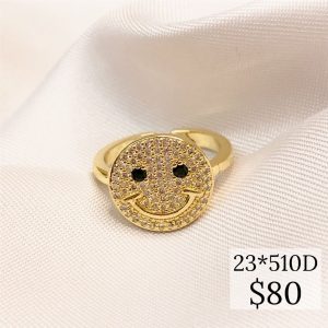 ANILLO CARA FELIZ TUPIDA OJOS NEGROS