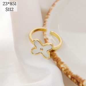 Anillo equis redondeada madre perla con punto centro