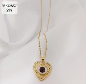 COLLAR CORAZON CZ CON RAYOS CENTRO CON OJO COLOR