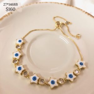 PULCERA ESTRELLAS OJO Y CZ BLANCO