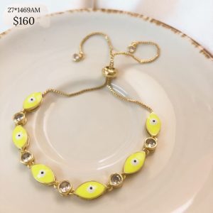 PULCERAS OJOS CZ AJUSTABLE AMARILLO