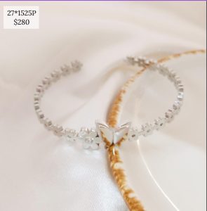 PULSO RIGIDO FLORES CON MARIPOSA AL CENTRO