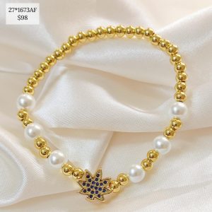 PULSERA PERLA DIJE TAMBOR FLOR