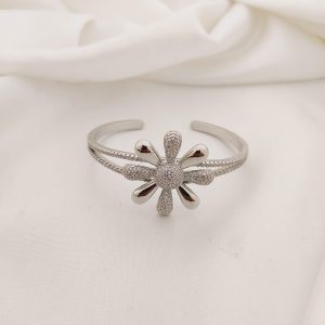 PULSO RIGIDO CON FLOR PETALOS PAVE Y LISOS