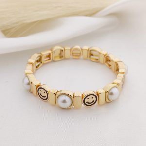 PULSO ELASTICO CARA FELIZ Y PERLA BOTON