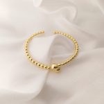 PULSO RIGIDO DE BOLITAS CON BOLA EN TERMINACION