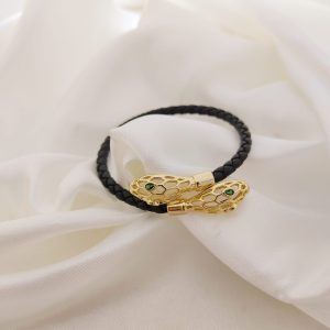 PULSO PIEL CON CABEZAS DE SERPIENTE OJOS VERDES