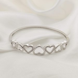 PULSO RIGIDO ARO DE CORAZONES ENCONTRADOS LISOS Y PAVE