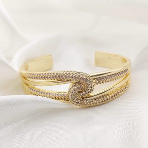 PULSO RIGIDO U ENTRELAZADAS PAVE Y 2 AROS LISOS