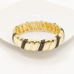 PULSO ELASTICO EN ENGRANES DIAGONAES ORO/CRISTAL