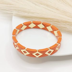 PULSO ELASTICO ROMBOS ORO MO?O COLOR