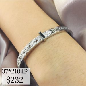 PULSO RIGIDO, CON 3 LINEAS Y BRILLOS