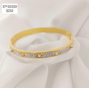 PULSERA TORNILLOS CZ DORADA