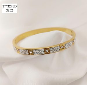 PULSERA TORNILLO Y TRAMO CZ DORADA