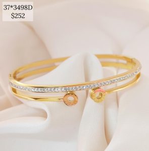 PULSO RIGIDO LINEA BRILLOS Y LINEA CON DOS DISCOS NUM ROM