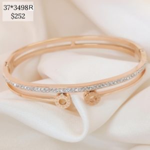 PULSO RIGIDO LINEA BRILLOS Y LINEA CON DOS DISCOS NUM ROM