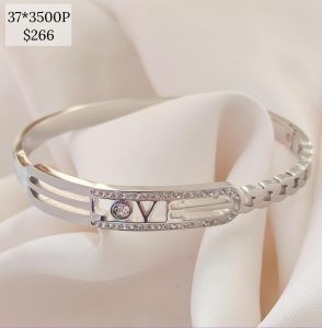 PULSO RIGIDO LENG?ETA BRILLOS LOVE Y CAD PLANCHADA