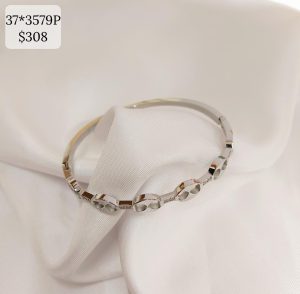 PULSO ENGRANES OVALOS CON UNION BRILLOS