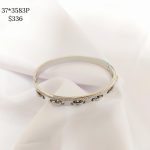 PULSO LISO CON COSTURAS Y LINEA BRILLOS