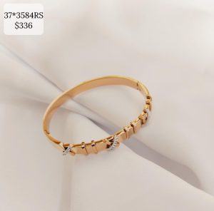 PULSO RIGIDO CON EQUIS BRILLOS Y BARRAS