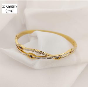 PULSO ARO DOS LINEAS ENTRELAZADAS CON OJOS Y CRISTALES