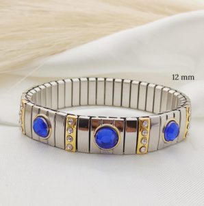 PULSO ELASTICO 12 MM CRISTALES RED FACETADOS Y LINEAS ORO CIRCONIAS