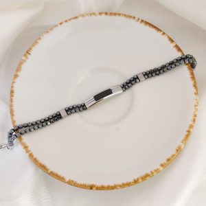 PULSO DOBLE LINEA BOLITAS PIEDRA CENTRO BARRA RECTANGULO  RAYADO