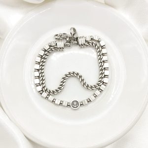 PULSO CADENA Y CUBITOS PIEDRA CON ANCLA CENTRO EN DISCO