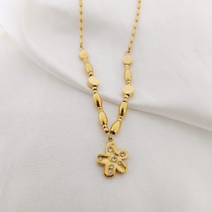 COLLAR SEMILLAS TAMBORES DIJE FLOR