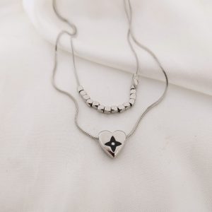 COLLAR DOBLE DIJE CORAZON Y MINI DADITOS